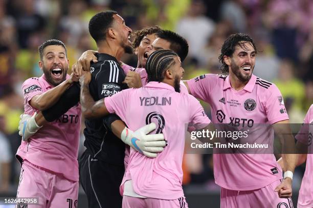 Drake Callender of Inter Miami celebrates with his teammates after blocking a penalty kick from Elliot Panicco of Nashville SC to win the Leagues Cup...