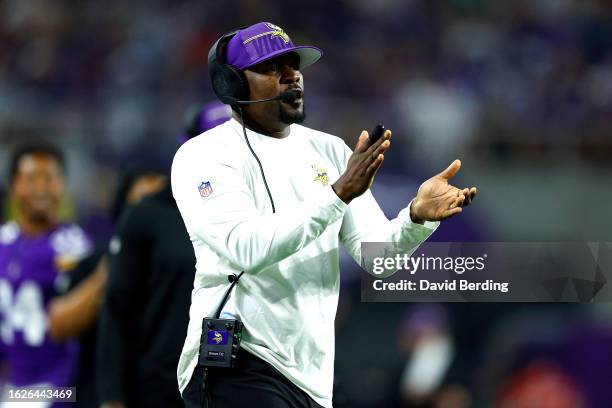 Defensive Coordinator Brian Flores of the Minnesota Vikings looks on against the Tennessee Titans in the second half during a preseason game at U.S....