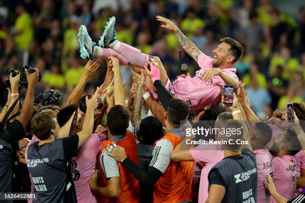 Lionel Messi of Inter Miami is hoisted in the air by his teammates after winning the Leagues Cup 2023 final match between Inter Miami CF and...