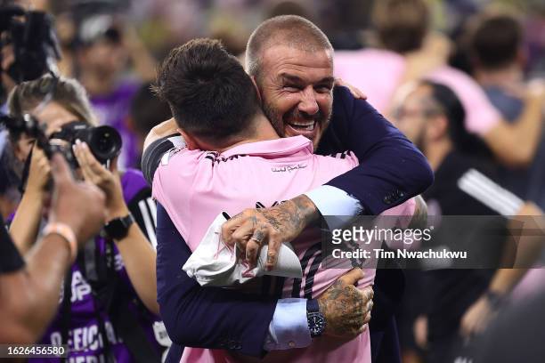 Co-owner David Beckham hugs Lionel Messi of Inter Miami after defeating Nashville SC in penalty shootout to win the Leagues Cup 2023 final match...