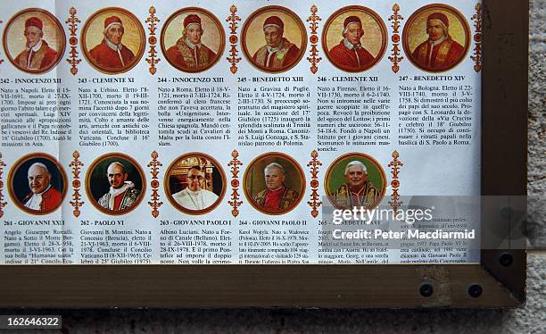 Poster showing images of all the Popes, past and present is displayed for sale on February 25, 2013 in Rome, Italy. The Pontiff will hold his last...