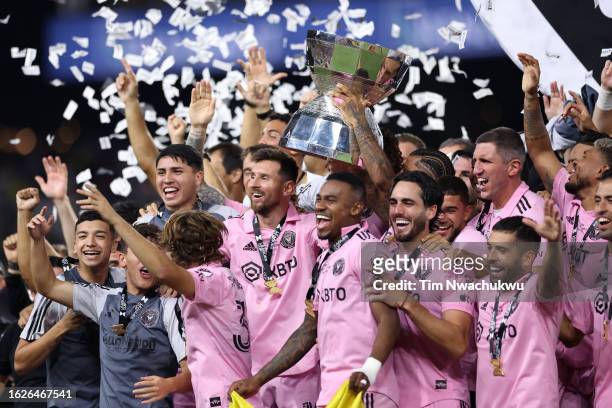 Lionel Messi of Inter Miami hoist the trophy with his teammates after defeating the Nashville SC to win the Leagues Cup 2023 final match between...