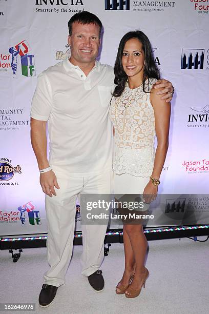 Zach Thomas and Maritza Thomas arrive at 2013 Jason Taylor Celebrity Golf Classic white party at Seminole Hard Rock Hotel & Casino ? Hard Rock Cafe...