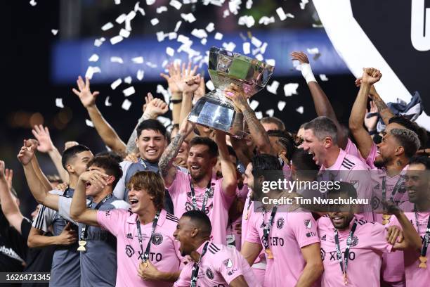 Lionel Messi of Inter Miami hoist the trophy with his teammates after defeating the Nashville SC to win the Leagues Cup 2023 final match between...