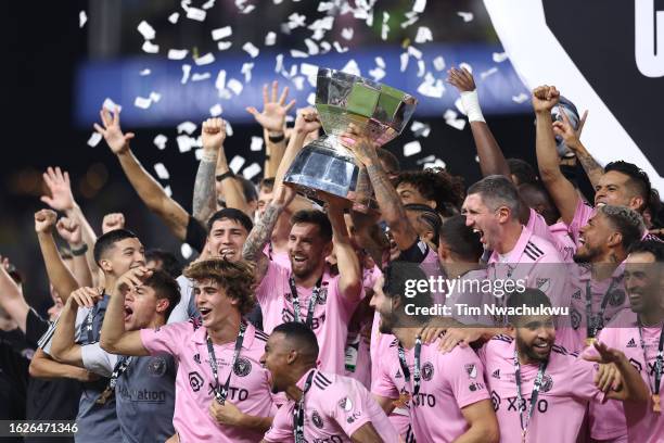 Lionel Messi of Inter Miami hoist the trophy with his teammates after defeating the Nashville SC to win the Leagues Cup 2023 final match between...