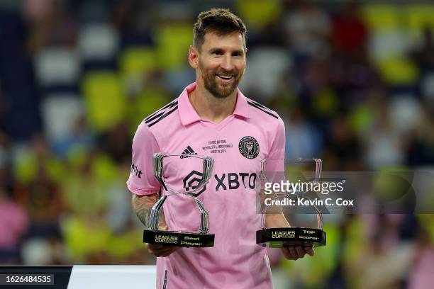 Lionel Messi of Inter Miami poses with his Best Player Award and Top Scorer Award after defeating the Nashville SC to win the Leagues Cup 2023 final...