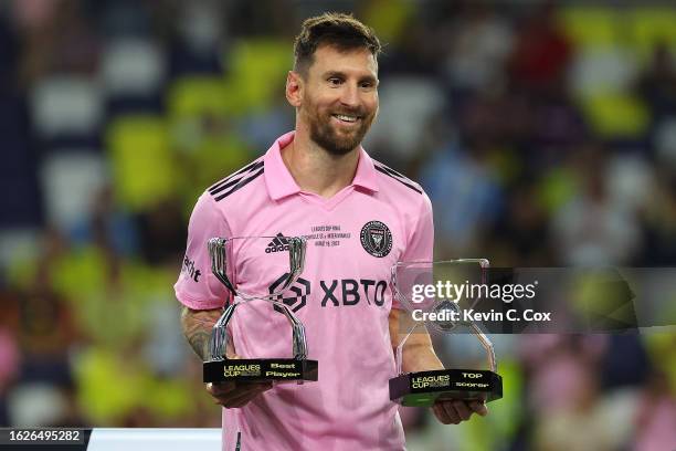 Lionel Messi of Inter Miami poses with his Best Player Award and Top Scorer Award after defeating the Nashville SC to win the Leagues Cup 2023 final...