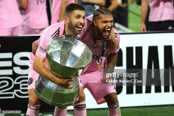 Jordi Alba and DeAndre Yedlin of Inter Miami celebrate with the trophy after defeating the Nashville SC to win the Leagues Cup 2023 final match...