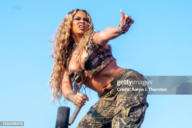 Latto performs onstage during Day 1 of the Afro Nation Detroit Festival on August 19, 2023 in Detroit, Michigan.