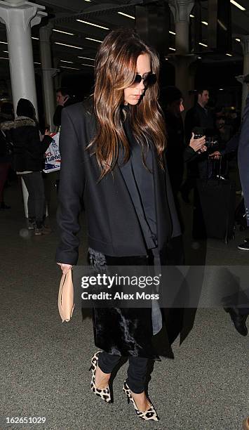 Victoria Beckham arrives back in London from Paris on February 25, 2013 in London, England.