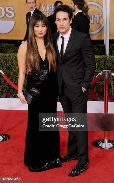 Actress Jenna Ushkowitz and guest arrive at the 19th Annual Screen Actors Guild Awards at The Shrine Auditorium on January 27, 2013 in Los Angeles,...