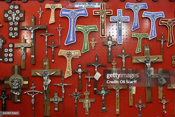 Selection of crucifixes are displayed for sale on February 25, 2013 in Rome, Italy. The Pontiff will hold his last weekly public audience on February...