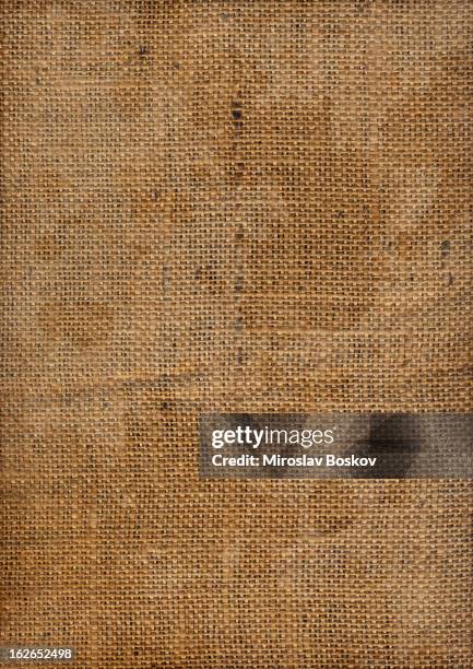 hi-res old coarse burlap canvas stained dappled vignette grunge texture - burlap sack stock pictures, royalty-free photos & images