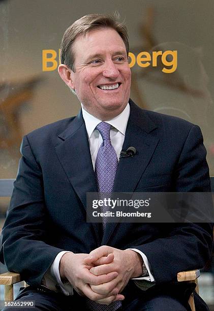 Chuck Jeannes, chief executive officer of Goldcorp Inc., smiles during a Bloomberg Television interview at the BMO Capital Global Metals and Mining...