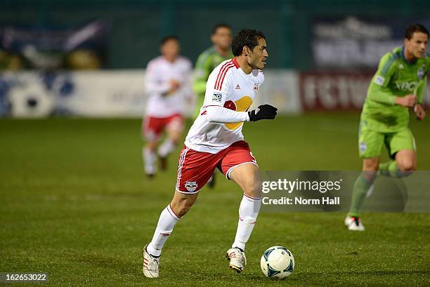 Fabian Espindola of the New York Red Bulls brings the ball up field against the Seattle Sounders at Kino Sports Complex on February 20, 2013 in...