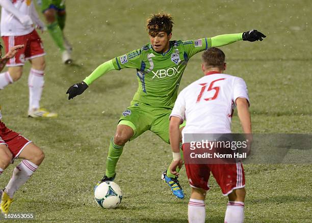 DeAndre Yedlin of the Seattle Sounders brings the ball up field against the New York Red Bulls at Kino Sports Complex on February 20, 2013 in Tucson,...