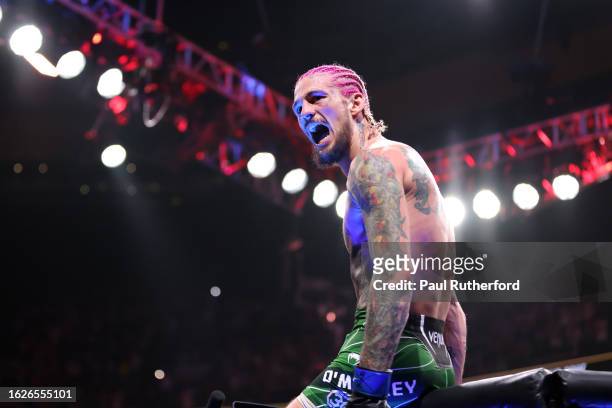 Sean O’Malley celebrates after defeating Aljamain Sterling during their Bantamweight title fight at UFC 292 at TD Garden on August 19, 2023 in...