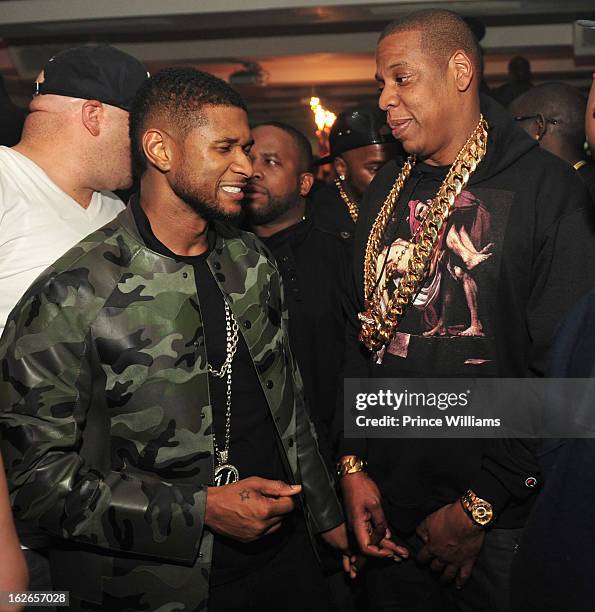 Usher and Jay-Z attend the So So Def anniversary party hosted by Jay Z at Compound on February 23, 2013 in Atlanta, Georgia.
