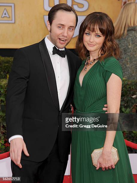 Actors Vincent Kartheiser and Alexis Bledel arrive at the 19th Annual Screen Actors Guild Awards at The Shrine Auditorium on January 27, 2013 in Los...