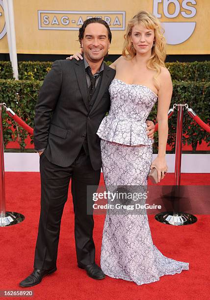 Actors Johnny Galecki and Kelli Garner arrive at the 19th Annual Screen Actors Guild Awards at The Shrine Auditorium on January 27, 2013 in Los...