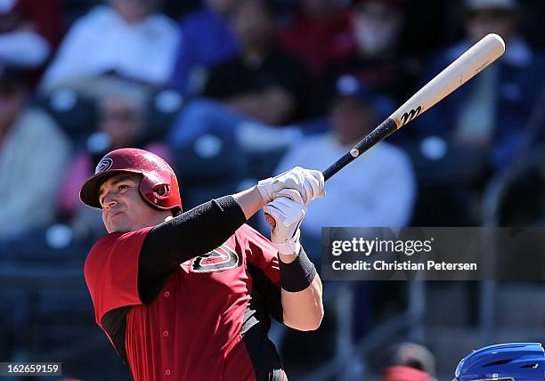 Rod Barajas of the Arizona Diamondbacks hits a double against the Kansas City Royals during the second inning of the spring training game at Surprise...