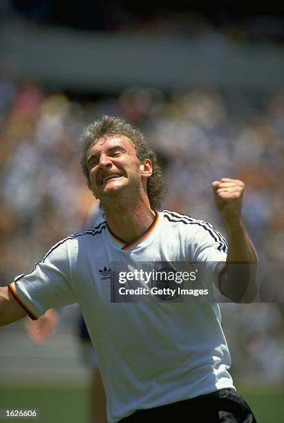 Rudi Voller of West Germany celebrates after scoring the first goal during the World Cup match between West Germany and Scotland in La Corregidora in...