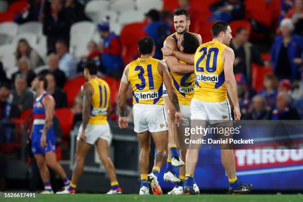 Eagles players celebrate on the final siren after winning the round 23 AFL match between Western Bulldogs and West Coast Eagles at Marvel Stadium, on...
