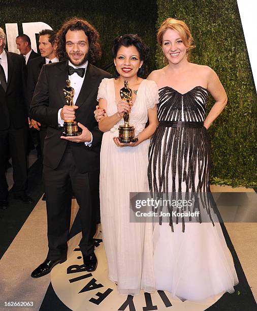 Filmmakers Sean Fine, artist Inocente Izucar, and Andrea Nix Fine attends the 2013 Vanity Fair Oscar party at Sunset Tower on February 24, 2013 in...