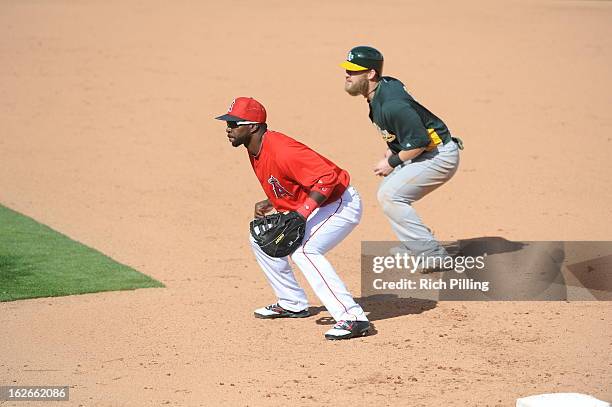 Bill Hall of the Los Angeles Angels of Anaheim fields during the game against the Oakland Athletics on February 24, 2013 at Tempe Diablo Stadium in...
