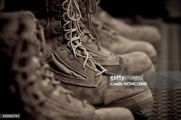 vintage combat boots - industrial dispute stock pictures, royalty-free photos & images