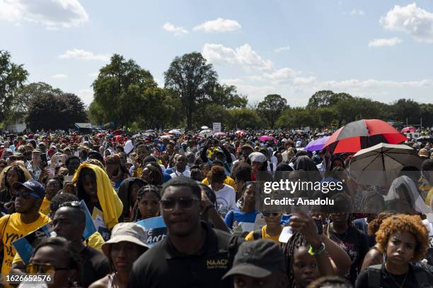 Demonstrators are seen on the 60th anniversary of the March On Washington and Martin Luther King Jr's historic 'I Have a Dream' speech at the Lincoln...