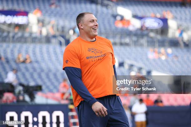 Garett Bolles of the Denver Broncos warms up before the preseason game against the Los Angeles Rams at Empower Field At Mile High on August 26, 2023...