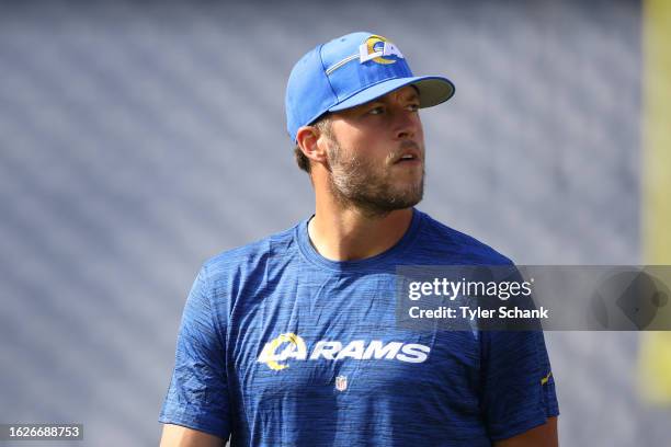 Matthew Stafford of the Los Angeles Rams warms up before the preseason game against the Denver Broncos at Empower Field At Mile High on August 26,...