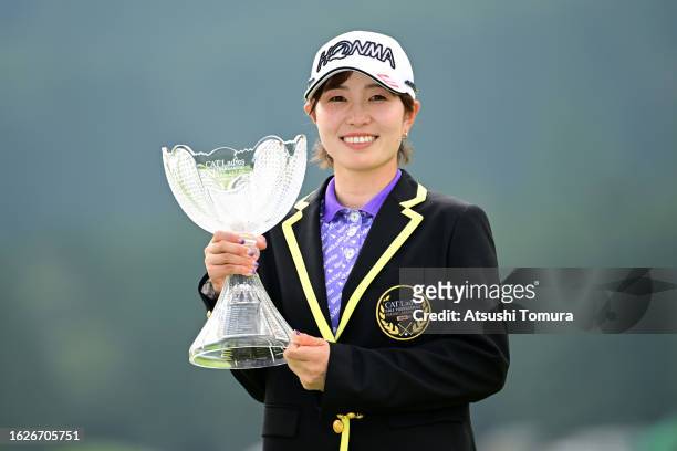 Minami Hiruta of Japan poses for a photo with the trophy after winning the tournament through the playoff following the final round of CAT Ladies...