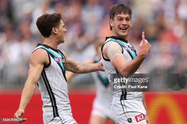 Zak Butters of the Power celebrates a goal during the round 23 AFL match between Fremantle Dockers and Port Adelaide Power at Optus Stadium, on...