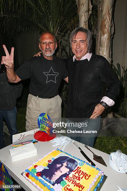 Jerry Rubin and radio personality Chris Carter attend George Harrison's 70th birthday celebration and cake cutting ceremony on February 25, 2013 in...