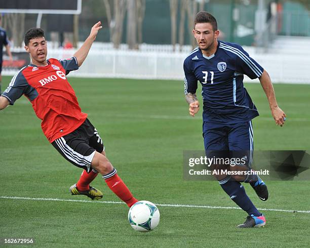 Defender Josh Gardner of Sporting Kansas City moves the ball upfield against Toronto FC February 23, 2013 in the final round of the Disney Pro Soccer...