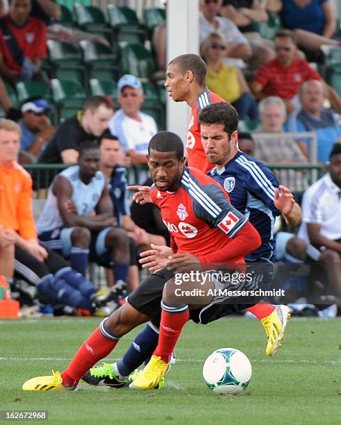 Defender Jeremy Hall of Toronto FC battles for the ball against Sporting Kansas City February 23, 2013 in the final round of the Disney Pro Soccer...