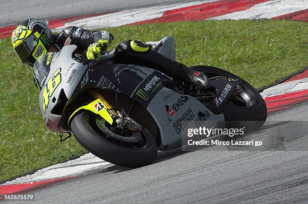 Valentino Rossi of Italy and Yamaha Factory Racing rounds the bend during day one of MotoGP Tests at Sepang Circuit on February 26, 2013 in Kuala...