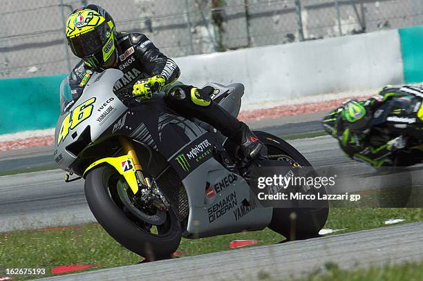 Valentino Rossi of Italy and Yamaha Factory Racing rounds the bend during day one of MotoGP Tests at Sepang Circuit on February 26, 2013 in Kuala...