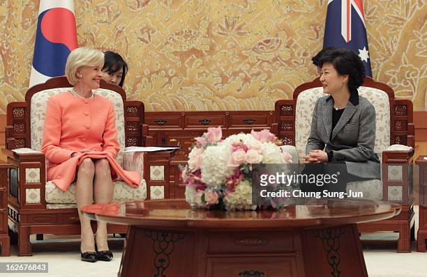 South Korean President Park Geun-Hye talks with Australian Governor-General Quentin Bryce during their meeting at presidential house on February 26,...