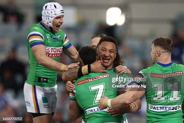 Josh Papali’i of the Raiders celebrates scoring a try with his teamates during the round 25 NRL match between Canberra Raiders and Canterbury...