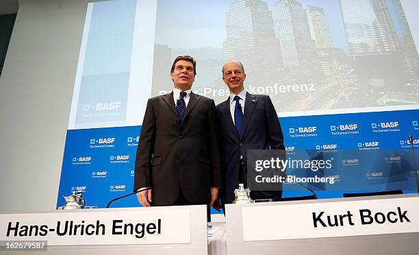Hans-Ulrich Engel, chief financial officer of BASF SE, left, and Kurt Bock, chief executive officer of BASF SE, pose for a photograph ahead of a news...