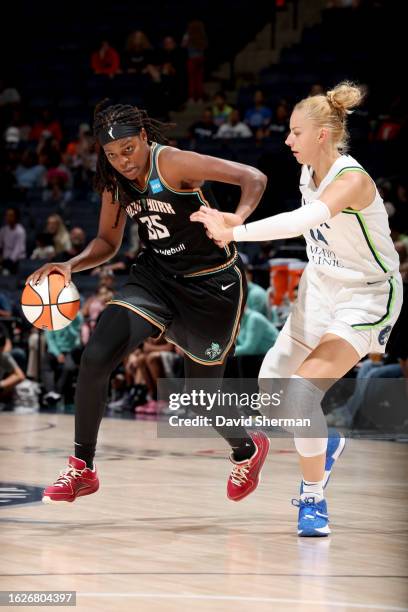Jonquel Jones of the New York Liberty dribbles the ball during the game against the Minnesota Lynx on August 26, 2023 at Target Center in...