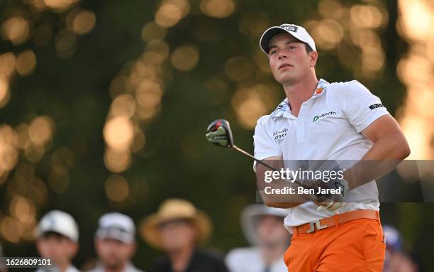 Viktor Hovland of Norway plays his shot from the 18th tee during the third round of the TOUR Championship at East Lake Golf Club on August 26, 2023...