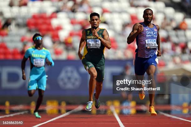 Wayde Van Niekerk of Team South Africa and Matthew Hudson-Smith of Team Great Britain compete in the Men's 400m Heats during day two of the World...