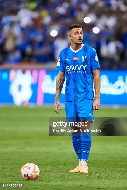 Sergej Milinkovic-Savic from Al Hilal Saudi FC controls the ball during the Saudi Pro League football match between Al Hilal Saudi FC and Al Faiha...