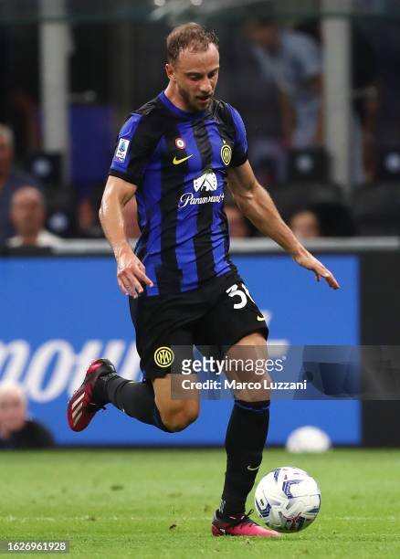 Carlos Augusto of FC Internazionale in action during the Serie A TIM match between FC Internazionale and AC Monza at Stadio Giuseppe Meazza on August...