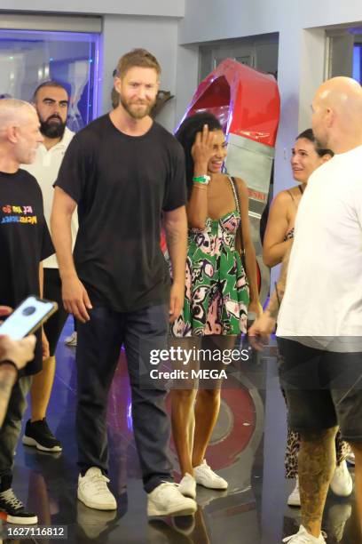 Calvin Harris and Vick Hope are seen arriving at Ushuaia nightclub for his closing night on August 25, 2023 in Ibiza, Spain.