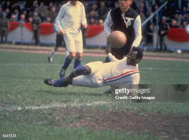 Pele of Brazil scores the equalizing goal for the Allied POW's during the match against Germany in Paris featured in the filming of ''Escape to...